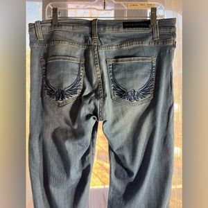 Rock & Republic flare jeans. With cute design packets in the back. Size 10
